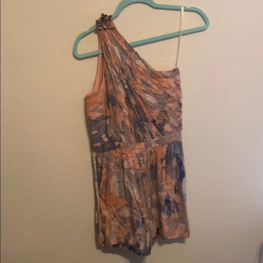 I’m selling this BCBG off the shoulder romper